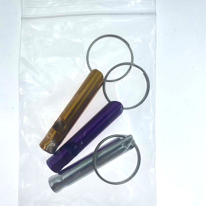 Picture of Outdoor aluminum alloy survival whistle wholesale portable key chain referee whistle high frequency emergency fire training survival whistle