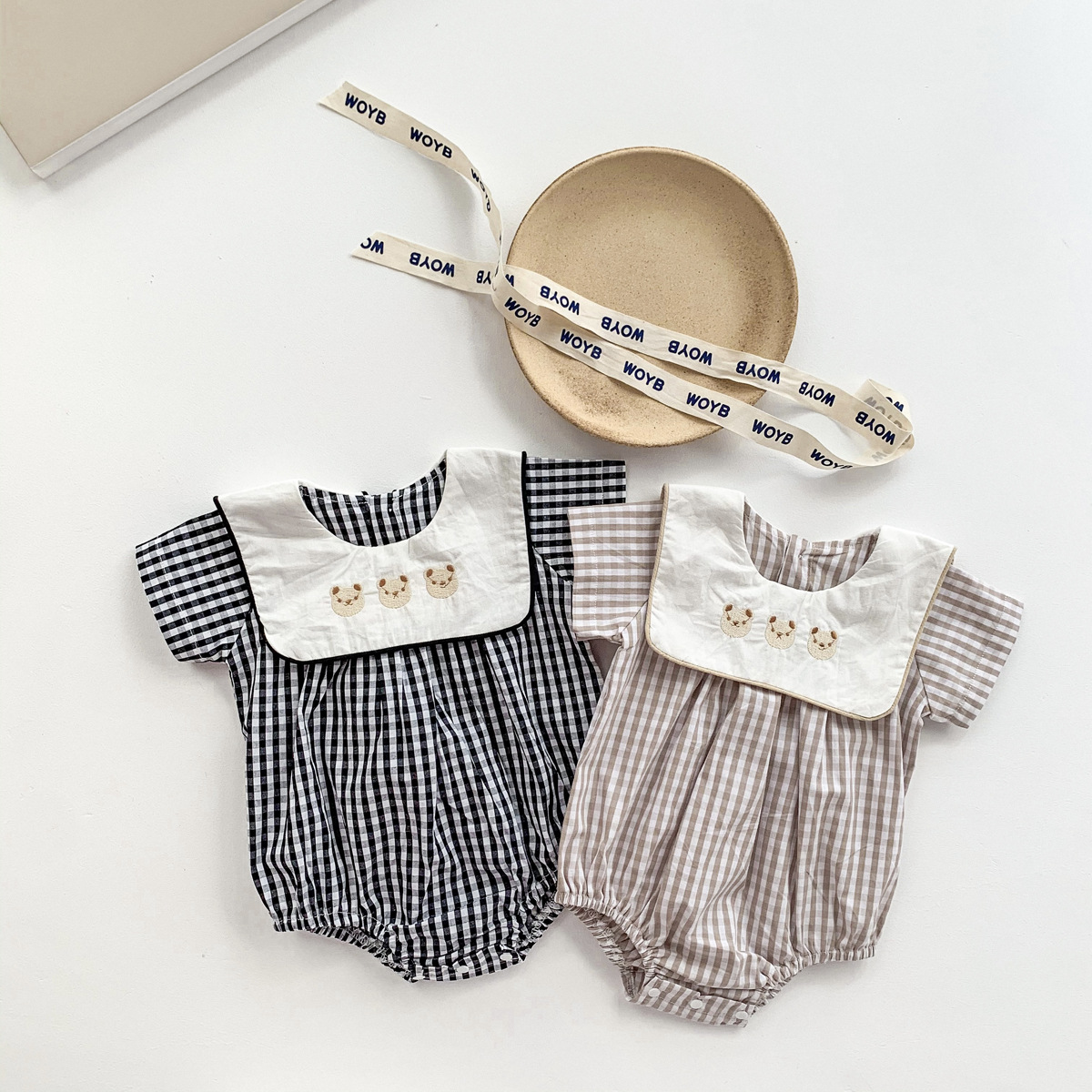 Picture of Korean Baby Jumpsuit Plaid Preppy Style Lapel Embroidered Bear Bag Fart Clothing Newborn Short-Sleeved Full Moon Outing Clothing