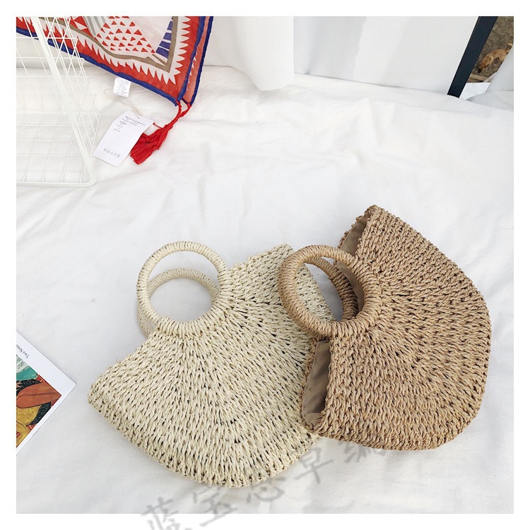 Picture of New semi-circular moon handbag hand-woven beach bag solid color all-match portable women's straw bag