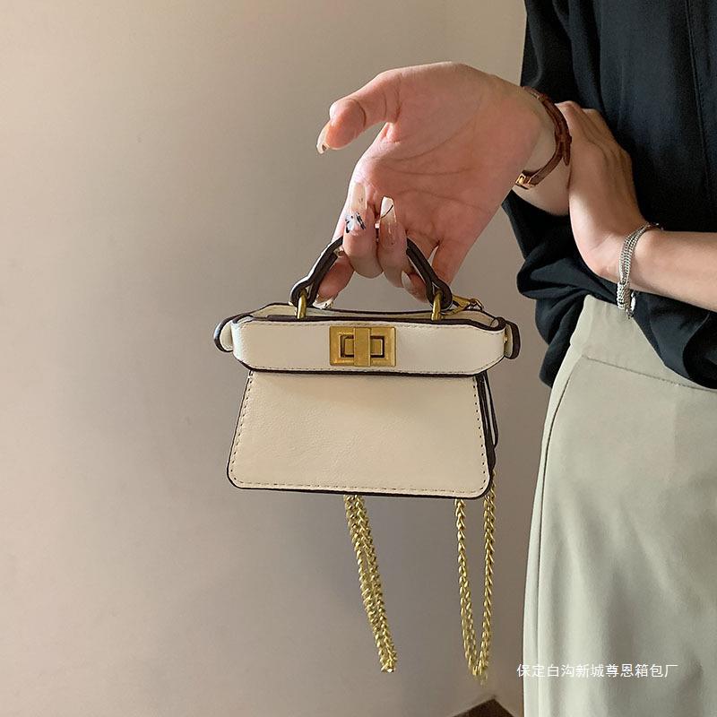 Picture of 2023 new cross-border small popular online catwalk with double-sided lock portable diagonal chain lipstick bag