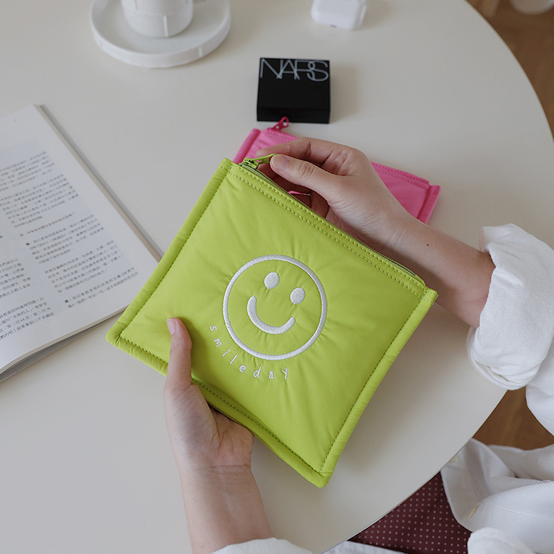 Picture of Korean Style Ins New Data Cable Storage Bag Simple Smiley Cosmetic Bag Portable Hand Bag Women's Cute Inner Bag