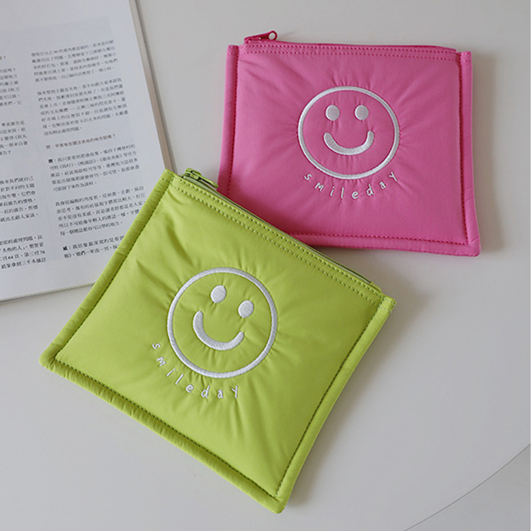 Picture of Korean Style Ins New Data Cable Storage Bag Simple Smiley Cosmetic Bag Portable Hand Bag Women's Cute Inner Bag