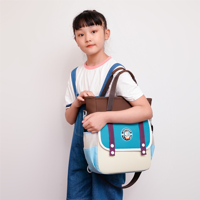 Picture of New track children's schoolbag 2024 new 1-6 grade three tutorial bag tutorial bag portable shoulder double shoulder