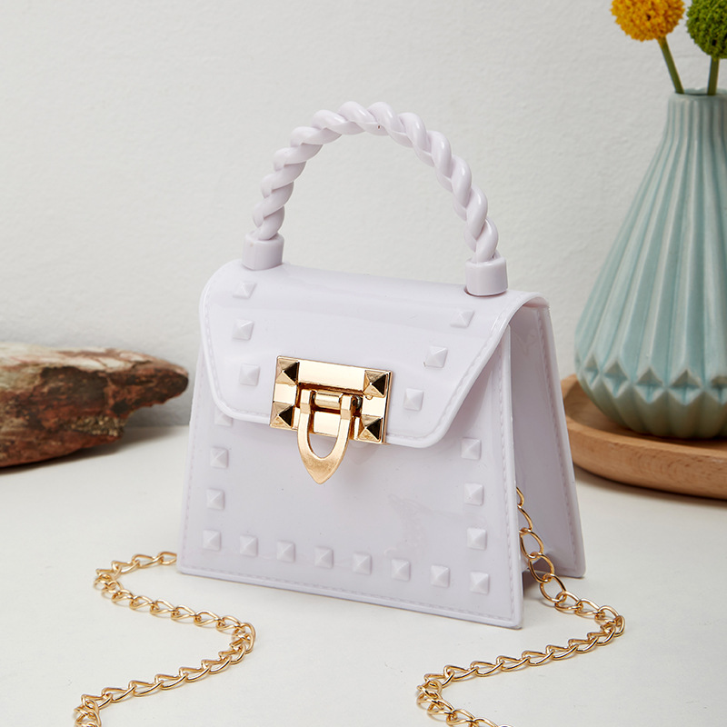 Picture of 2023 new fashion simple solid color rivet portable PVS mini jelly bag shoulder slung mouth red envelope wholesale