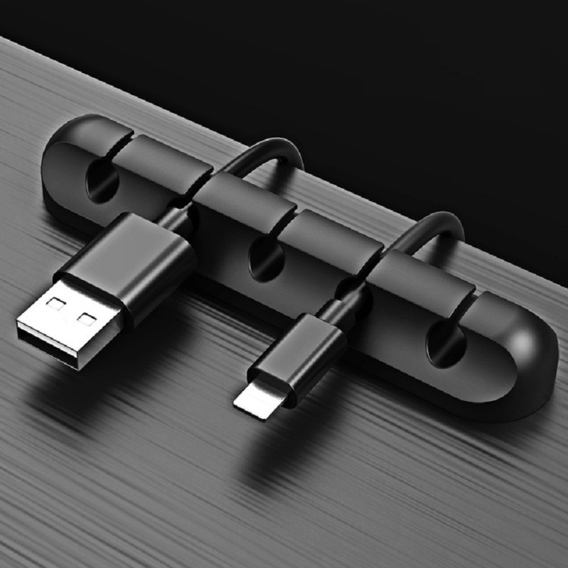 Picture of Desktop charging data cable organizer silicone creative gift storage solid wire clip