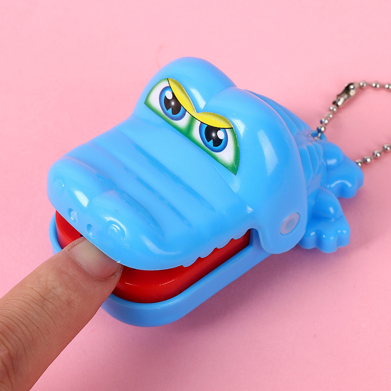 Picture of Hot sale children bite hand crocodile mini crocodile bite finger party game props keychain trick prank each other