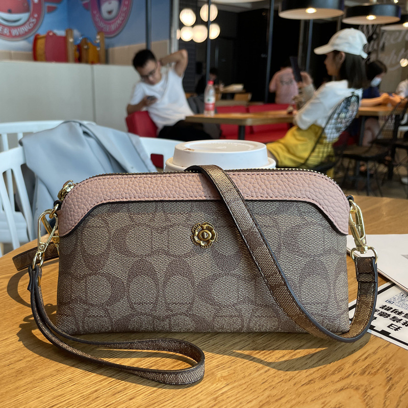 Picture of 2025 New Handbags Women's Small Bags Fashionable Shoulder Crossbody Bags Trendy Wallets Women's Long Mobile Phone Bags Mom's Style
