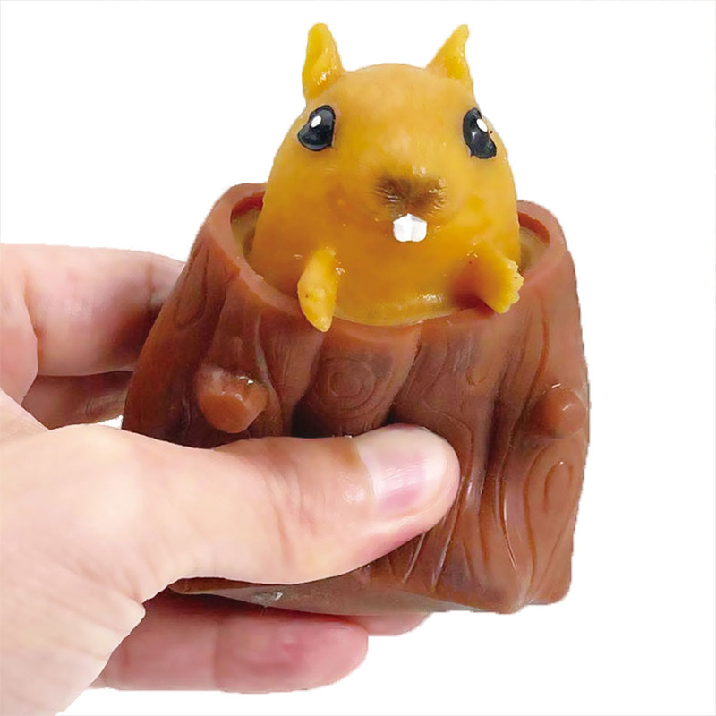 Picture of Decompression toy evil squirrel Cup stump small squirrel decompression artifact squeeze pinch music rubber cage tree hole