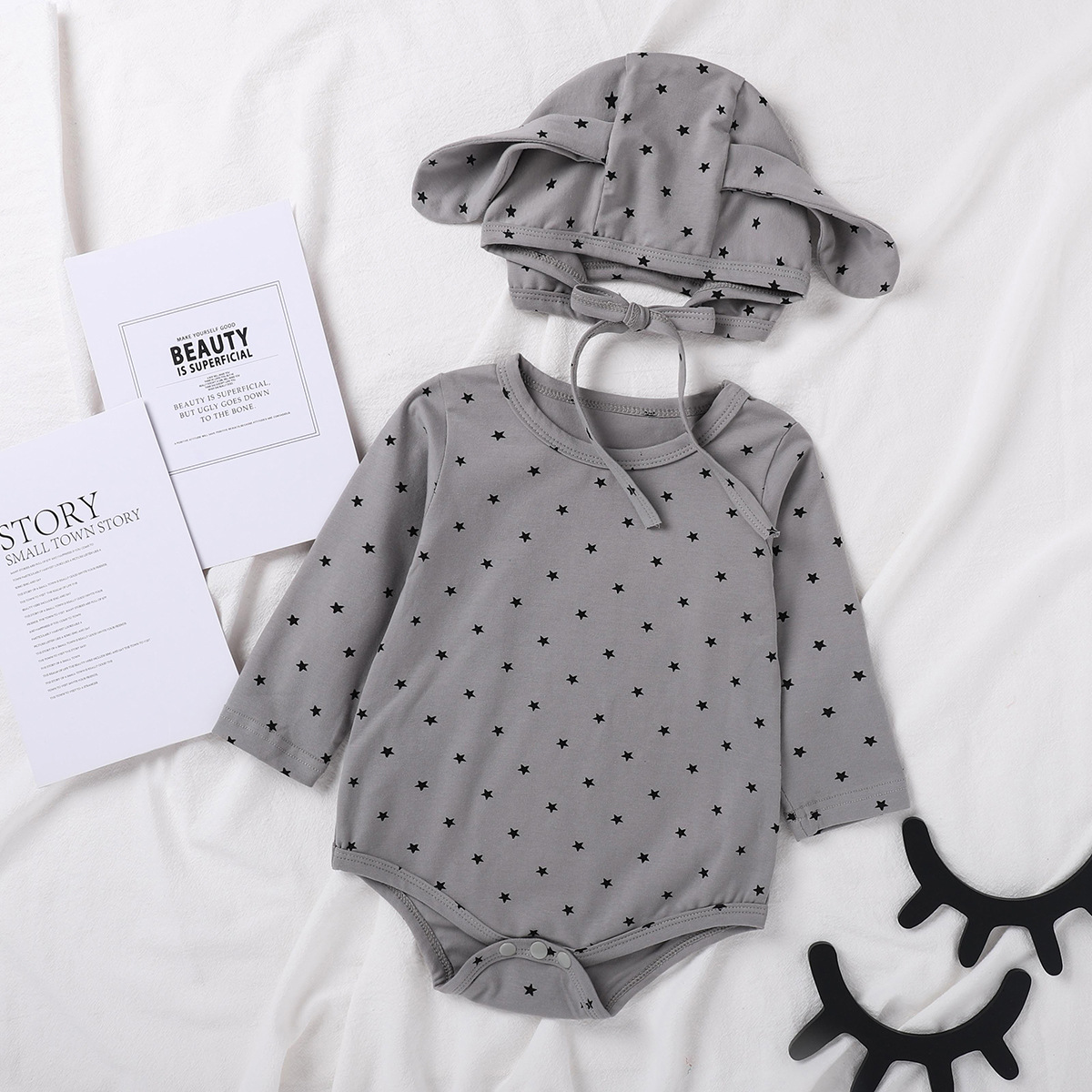 Picture of 2025 Spring and Autumn Korean Style Baby Jumpsuit Western Style Long Sleeve Polka Dot Male and Female Baby Coverall Outing Clothes with Hood