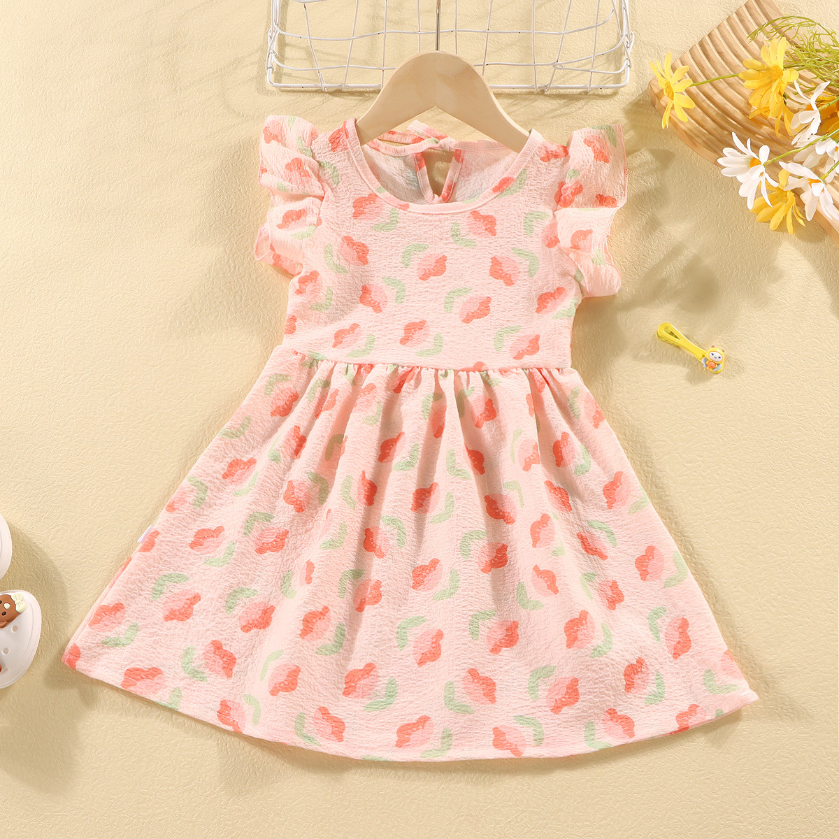 Picture of Girls' short-sleeved T-shirt 2024 new summer baby girls' off-shoulder strap fashionable western style top for infants and children
