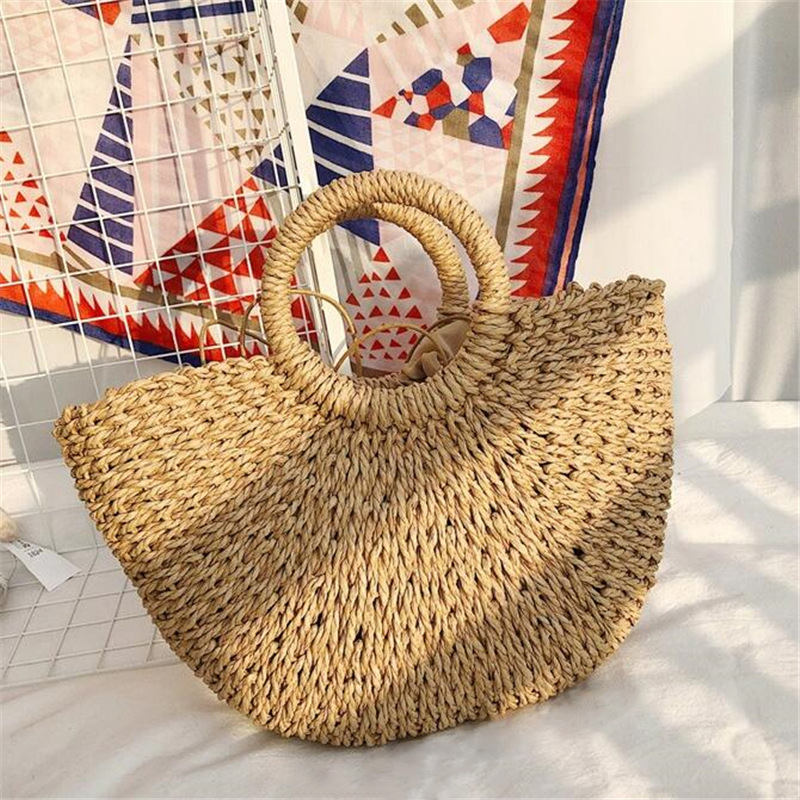 Picture of New semi-circular moon handbag hand-woven beach bag solid color all-match portable women's straw bag