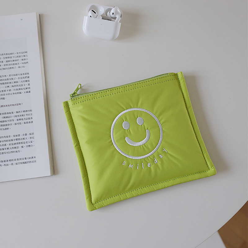 Picture of Korean Style Ins New Data Cable Storage Bag Simple Smiley Cosmetic Bag Portable Hand Bag Women's Cute Inner Bag