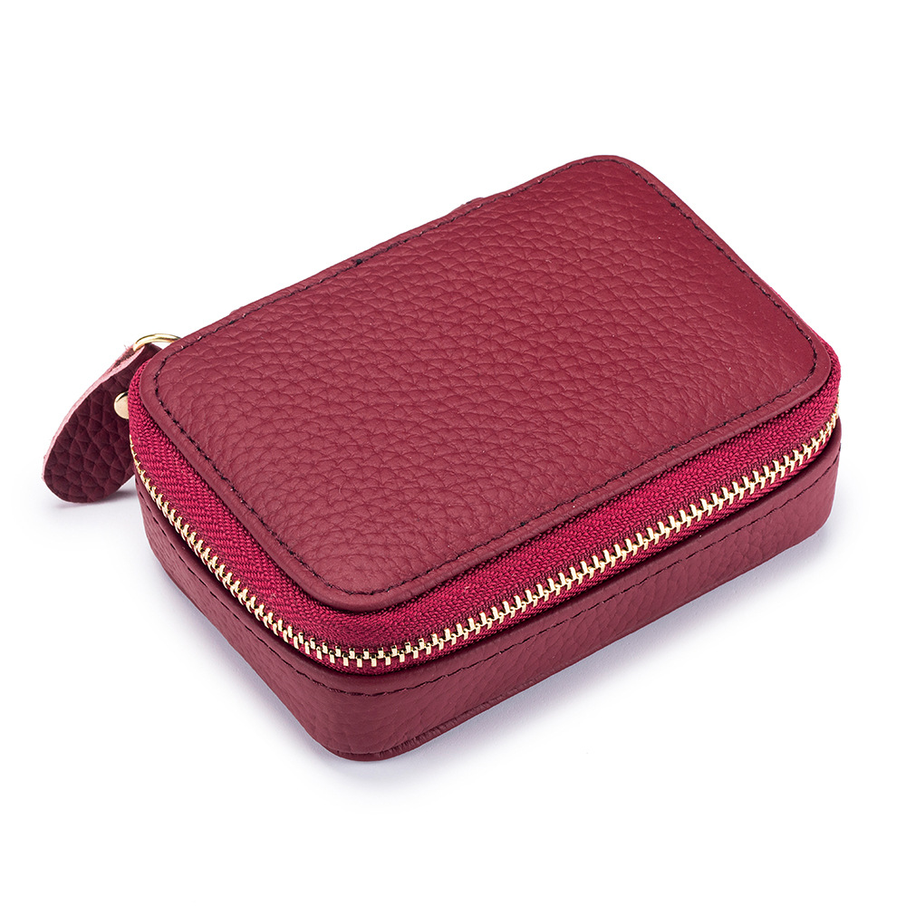 Picture of 2024 Genuine Leather Mini Portable Lipstick Bag with Mirror First Layer Cowhide Storage Bag Coin Coin Headphone Bag for Women