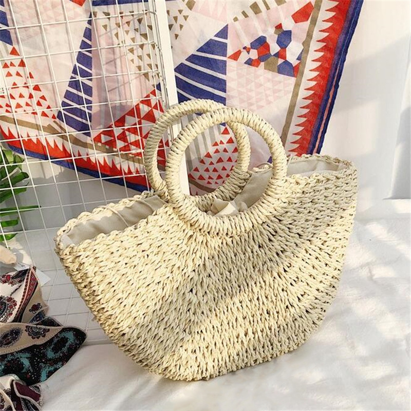 Picture of New semi-circular moon handbag hand-woven beach bag solid color all-match portable women's straw bag