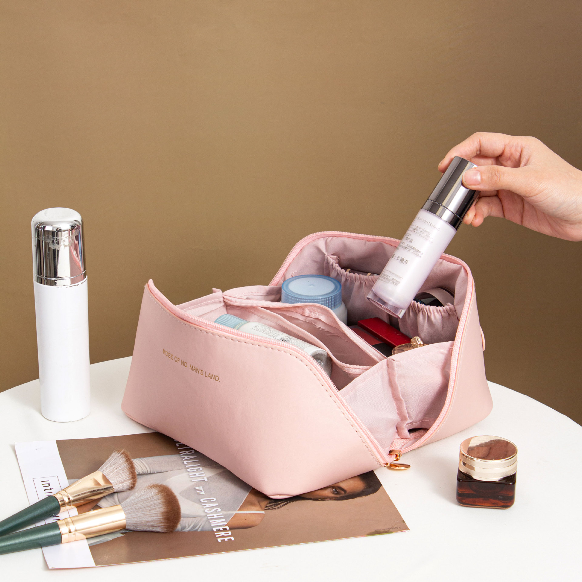 Picture of Ins Portable Large Capacity PU Portable Toiletry Bag Travel Partition Storage Bag Organ Pillow Cosmetic Bag Wholesale