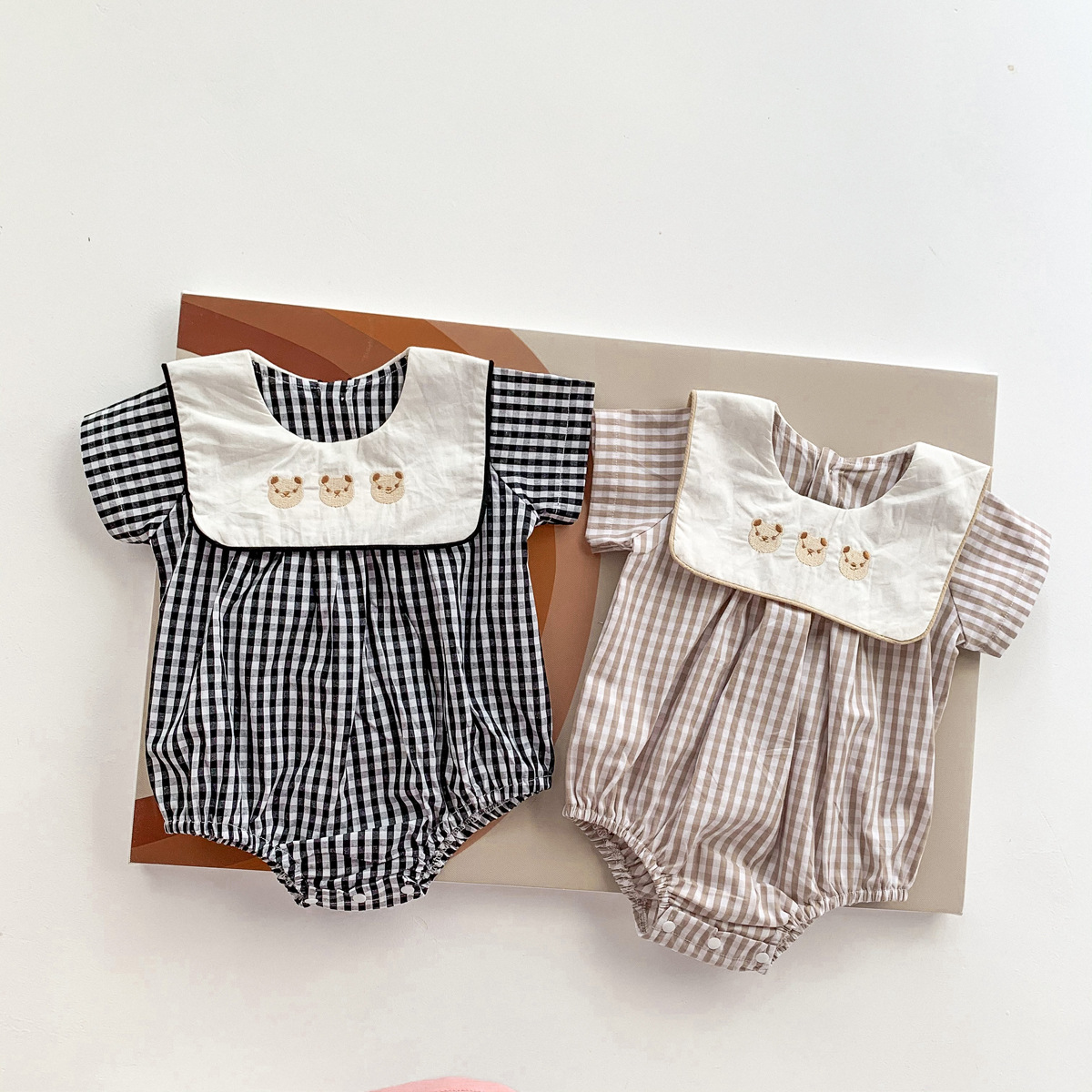 Picture of Korean Baby Jumpsuit Plaid Preppy Style Lapel Embroidered Bear Bag Fart Clothing Newborn Short-Sleeved Full Moon Outing Clothing