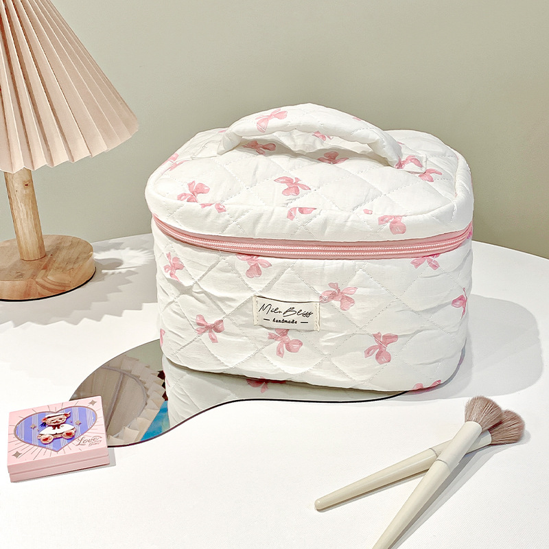 Picture of Simple bow travel portable cosmetic bag large capacity high-end feeling ins high-value cosmetic bag a batch
