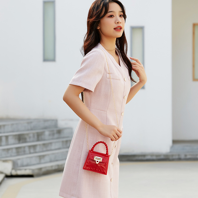 Picture of 2023 new fashion simple solid color rivet portable PVS mini jelly bag shoulder slung mouth red envelope wholesale