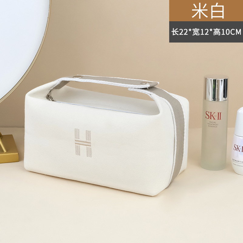 Picture of New ins canvas portable cosmetic bag large capacity wash bag women portable travel storage bag manufacturers wholesale