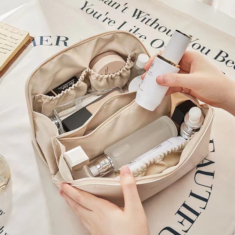 Picture of Portable Pillow Cosmetic Bag ins Advanced Sense Internet Popular pu Cosmetic Bag Travel Storage Bag Large Capacity Women's Wash Bag