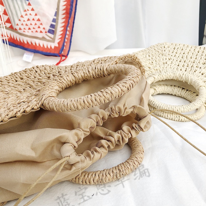 Picture of New semi-circular moon handbag hand-woven beach bag solid color all-match portable women's straw bag