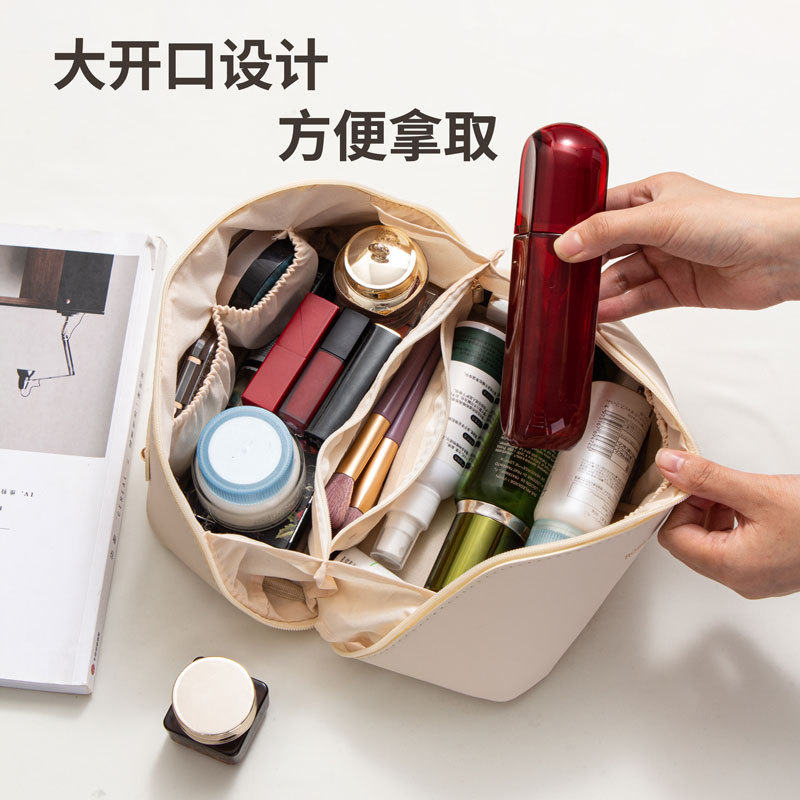 Picture of Ins Portable Large Capacity PU Portable Toiletry Bag Travel Partition Storage Bag Organ Pillow Cosmetic Bag Wholesale