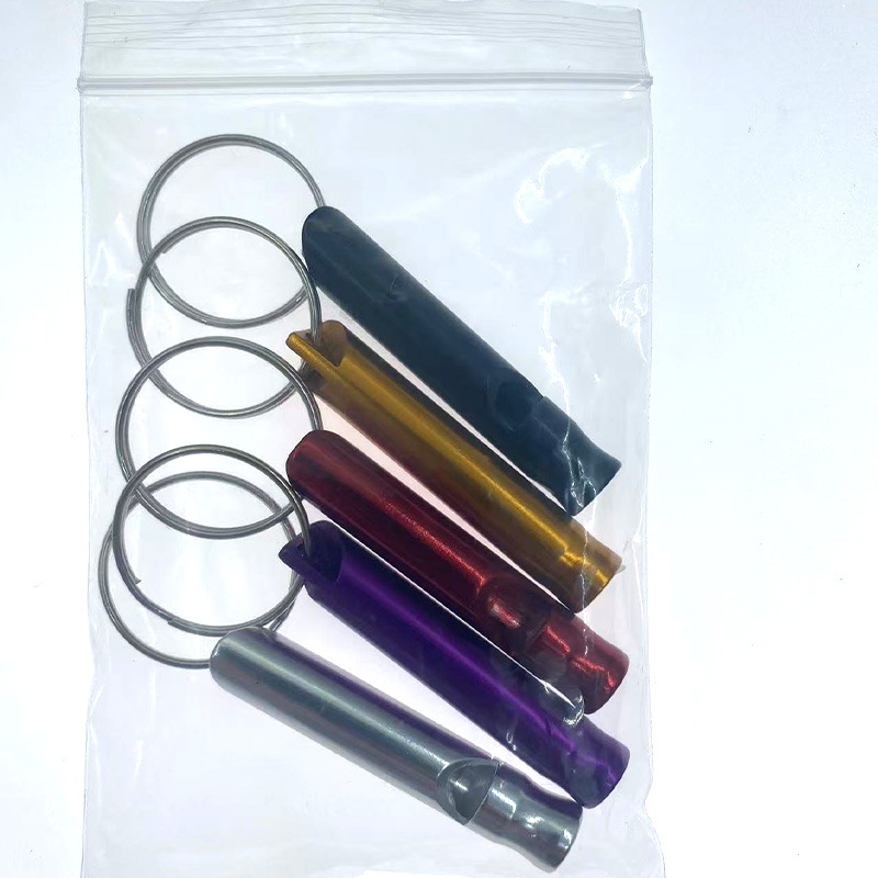 Picture of Outdoor aluminum alloy survival whistle wholesale portable key chain referee whistle high frequency emergency fire training survival whistle