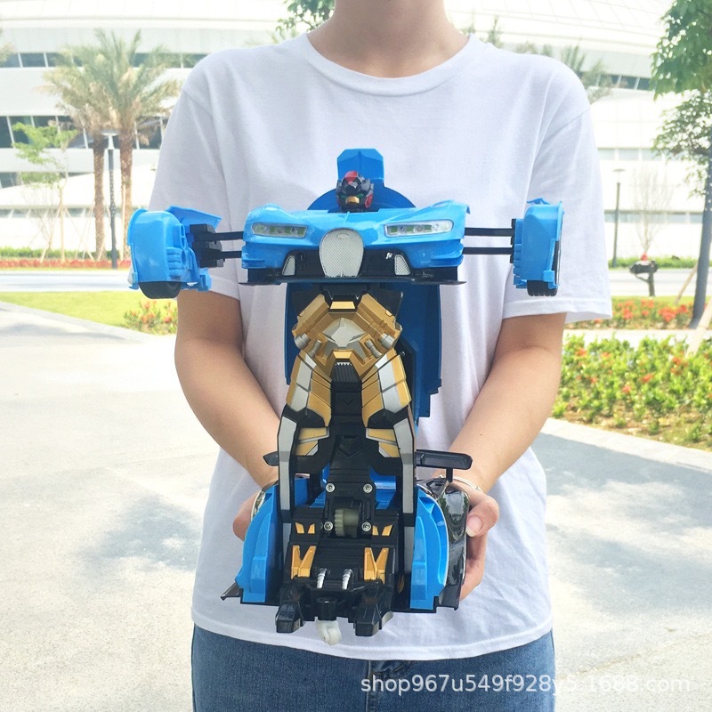 Picture of Gesture sensing one-key deformation remote control car charger electric car robot King Kong racing children's toy car generation
