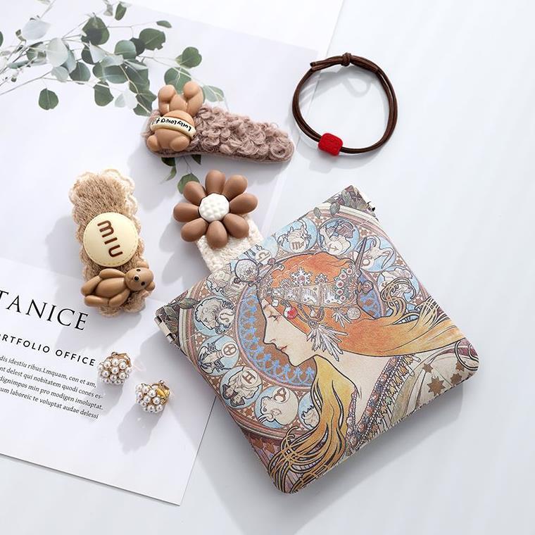 Picture of ins niche shrapnel Musa song Small size cosmetic bag portable makeup small bag storage bag liner bag lipstick bag