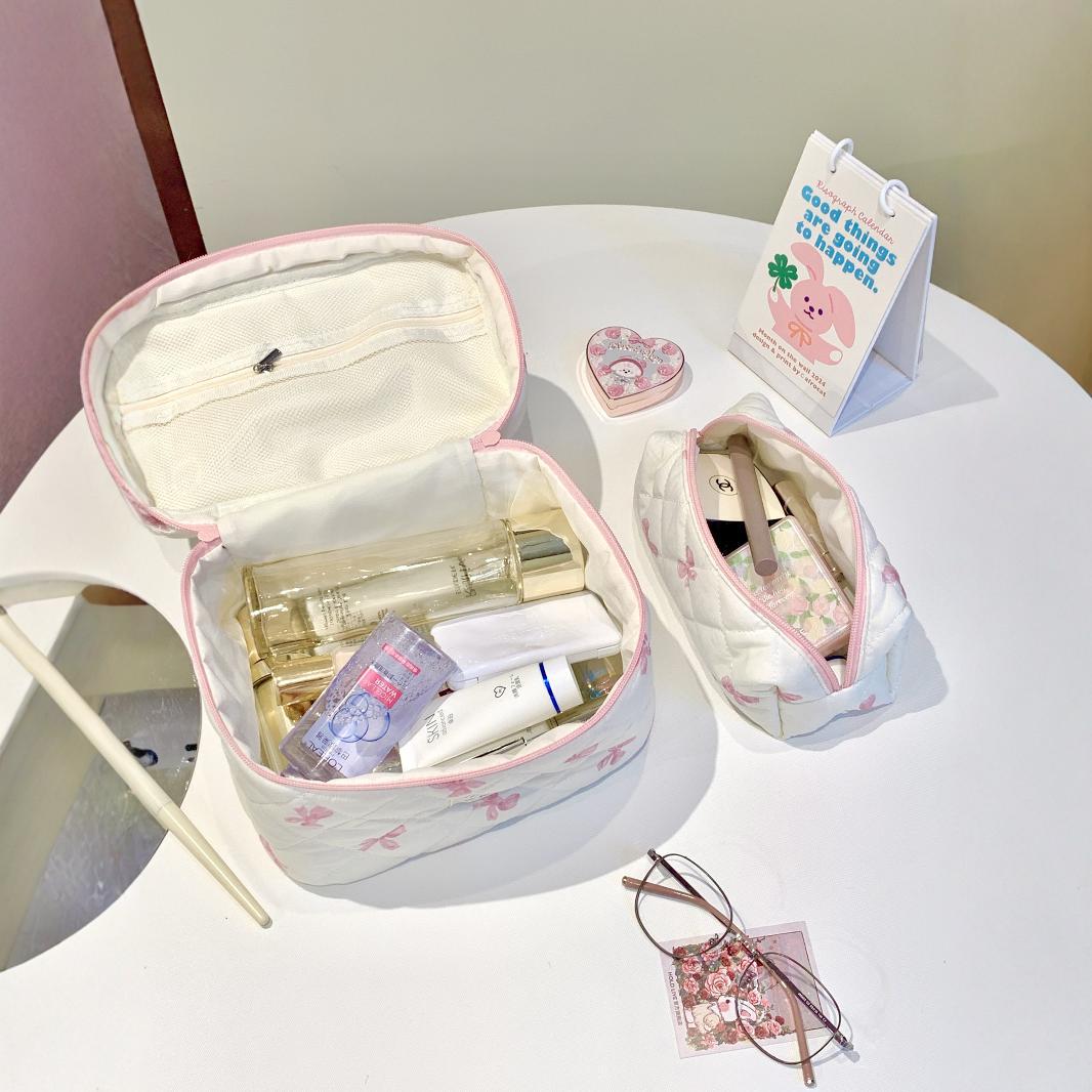 Picture of Simple bow travel portable cosmetic bag large capacity high-end feeling ins high-value cosmetic bag a batch