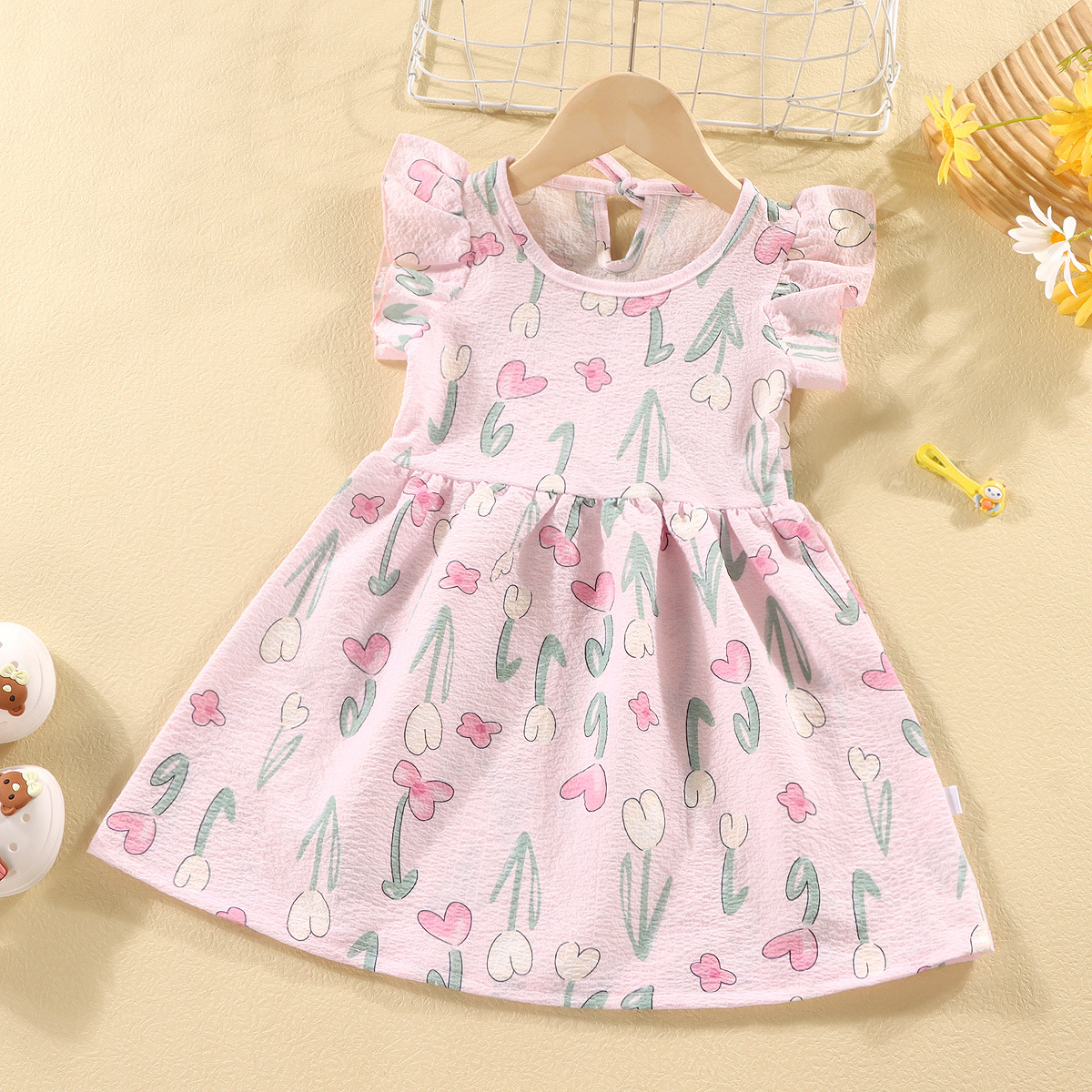 Picture of Girls' short-sleeved T-shirt 2024 new summer baby girls' off-shoulder strap fashionable western style top for infants and children