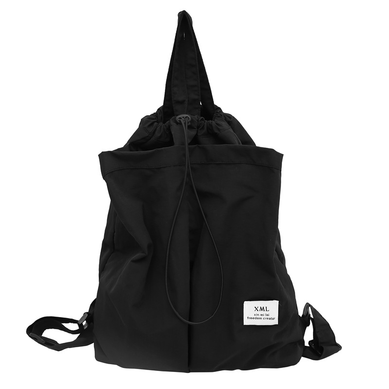 Picture of Large Capacity Solid Color Backpack Women's 2024 New Casual All-match Schoolbag Student Backpack Fashion Commuter Handbag