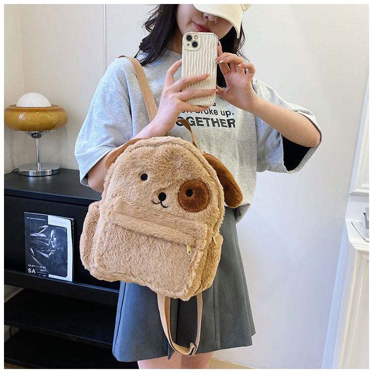 Picture of 2024 New Stuffed Puppy Backpack Cute Soft Girl Plush Bag Furry Bag School Bag Cartoon Student Small Backpack