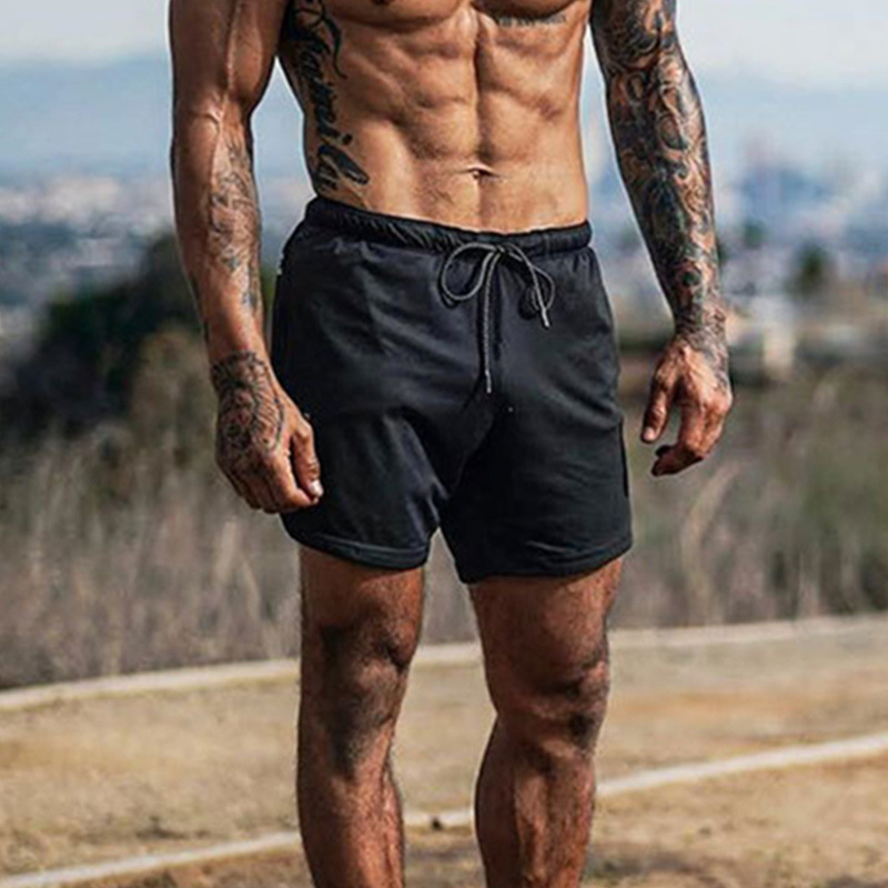 Cross-border AliExpress light board sports shorts men's summer fitness quick-drying breathable shorts mesh stretch beach pants