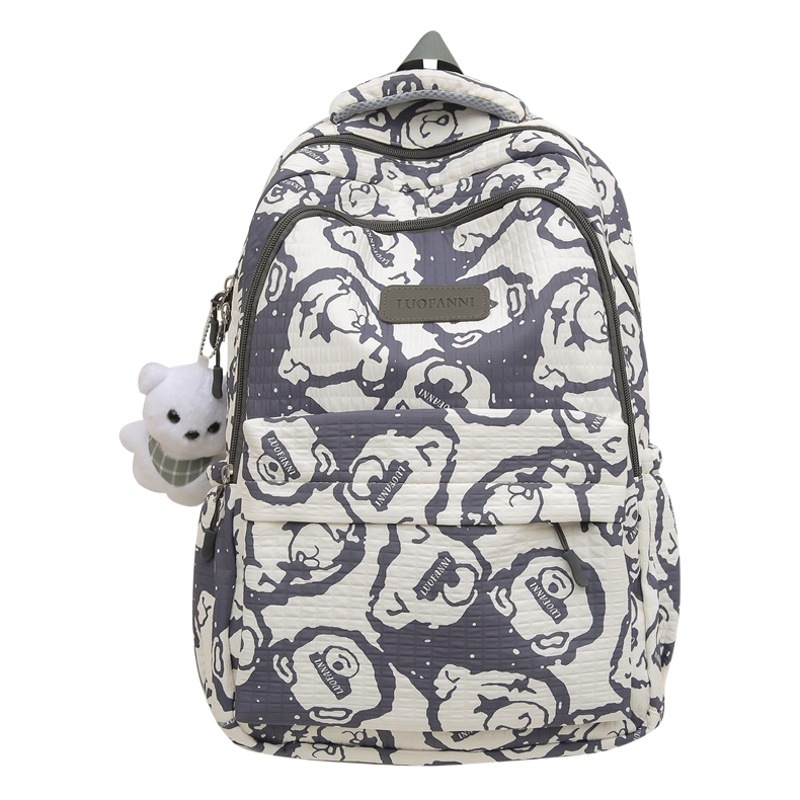 Junior high school student large capacity backpack cartoon high-looking high school student schoolbag all-matching Rui camp computer backpack men