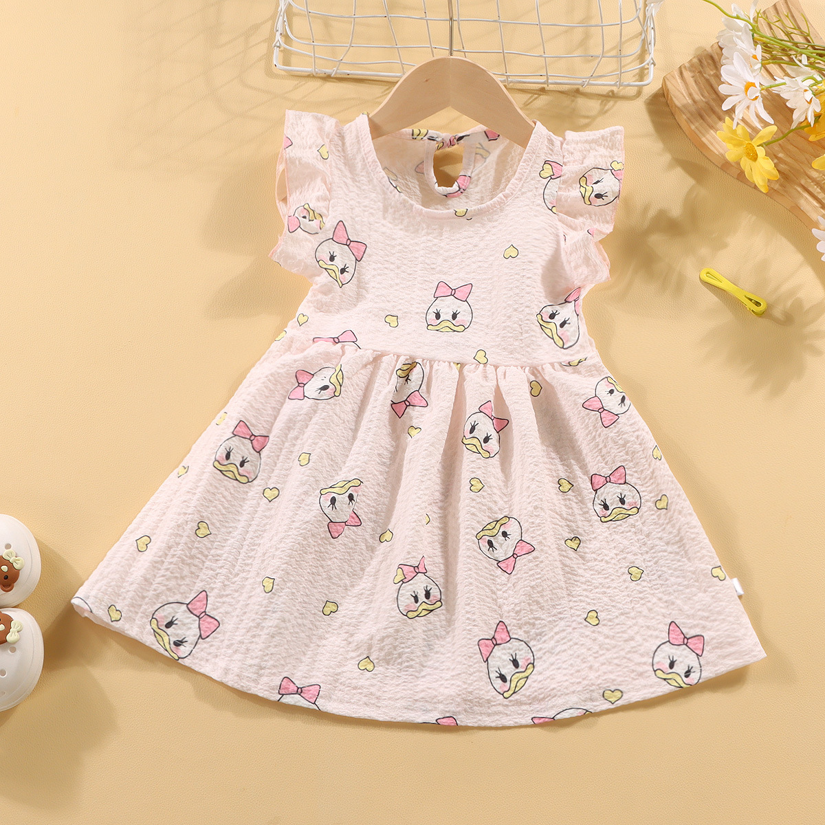 Picture of Girls' short-sleeved T-shirt 2024 new summer baby girls' off-shoulder strap fashionable western style top for infants and children