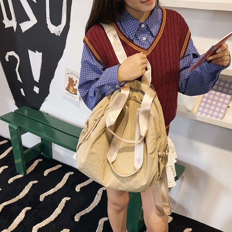 Picture of Cross-border Korean version of simple multi-purpose large-capacity schoolbag for men and women 24 new fashion student backpack wholesale