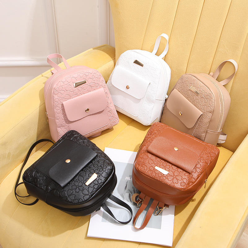Sweet and cute mini backpack fashion personality flower embossed small schoolbag a generation of children's Girl backpack