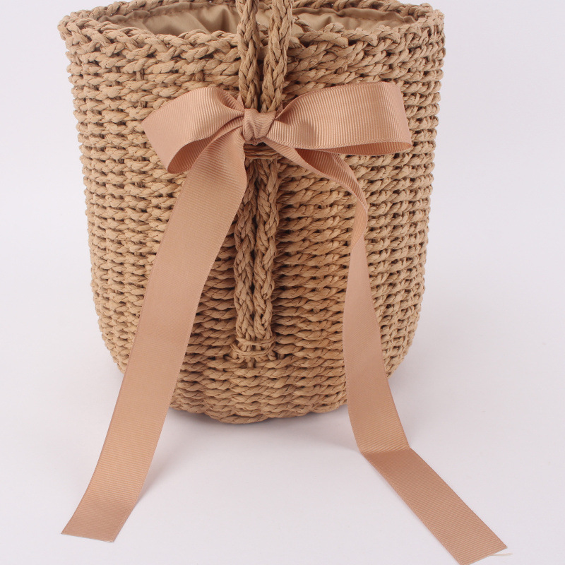 Picture of Dropshipping Simple Pure Color Straw Bag Forest Style One-Shoulder Hand-Carrying Cross-Body Bucket Woven Bag Cylindrical Beach Bag for Women