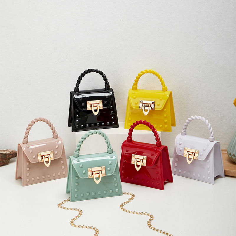 Picture of 2023 new fashion simple solid color rivet portable PVS mini jelly bag shoulder slung mouth red envelope wholesale