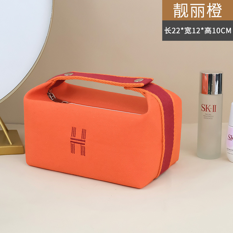 Picture of New ins canvas portable cosmetic bag large capacity wash bag women portable travel storage bag manufacturers wholesale