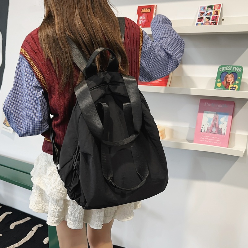 Cross-border Korean version of simple multi-purpose large-capacity schoolbag for men and women 24 new fashion student backpack wholesale