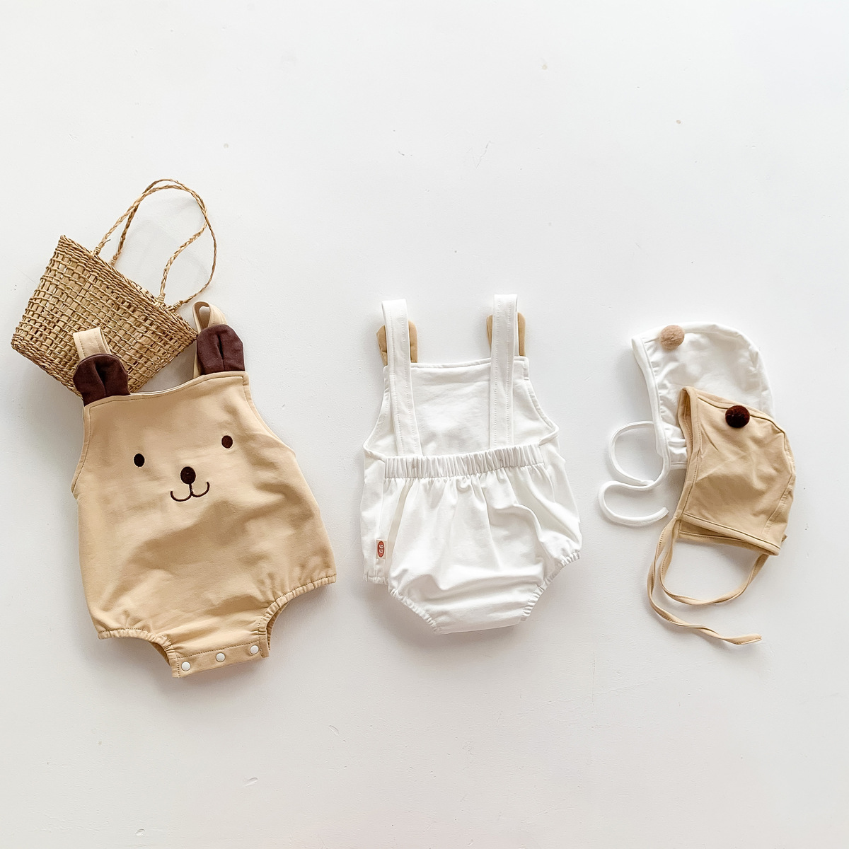 Picture of 2025 Baby Clothes Summer Cute Bear Sleeveless Sling Bag Fart Clothes for Boys and Girls, Two Sets of Hats