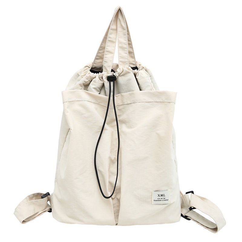 Picture of Large Capacity Solid Color Backpack Women's 2024 New Casual All-match Schoolbag Student Backpack Fashion Commuter Handbag