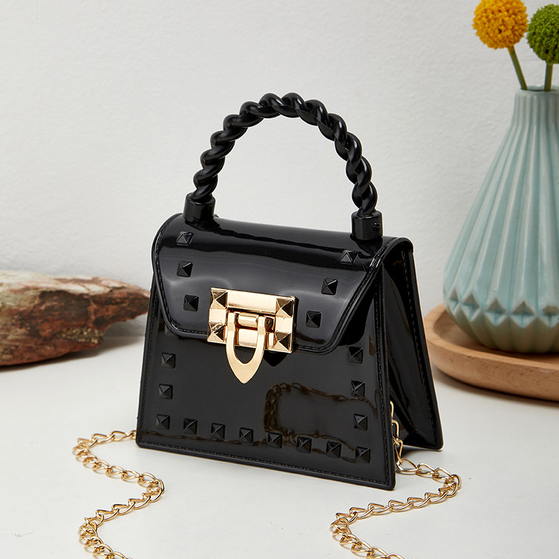 Picture of 2023 new fashion simple solid color rivet portable PVS mini jelly bag shoulder slung mouth red envelope wholesale