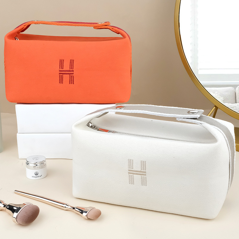 Picture of New ins canvas portable cosmetic bag large capacity wash bag women portable travel storage bag manufacturers wholesale