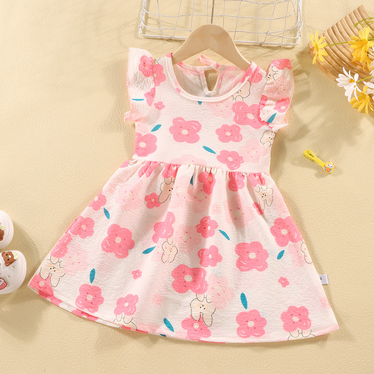 Picture of Girls' short-sleeved T-shirt 2024 new summer baby girls' off-shoulder strap fashionable western style top for infants and children