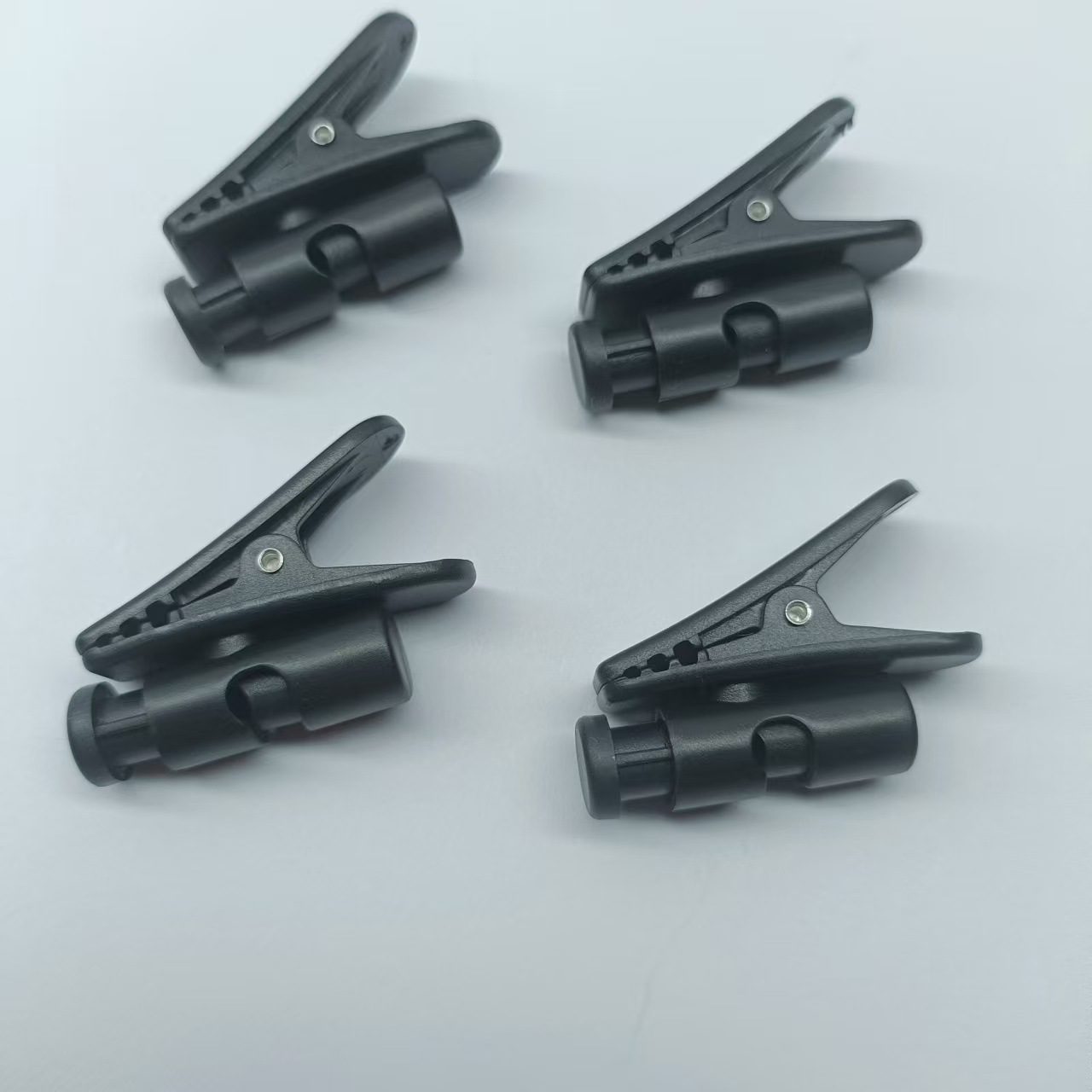 Picture of Rotatable earphone cord clip Anti-lost cord clip Collar clip Mobile phone earphone accessories Universal earplug cord fixing clip