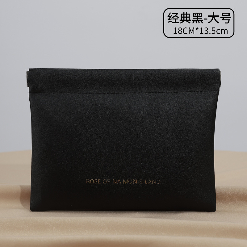 Picture of Ins Portable Large Capacity PU Portable Toiletry Bag Travel Partition Storage Bag Organ Pillow Cosmetic Bag Wholesale