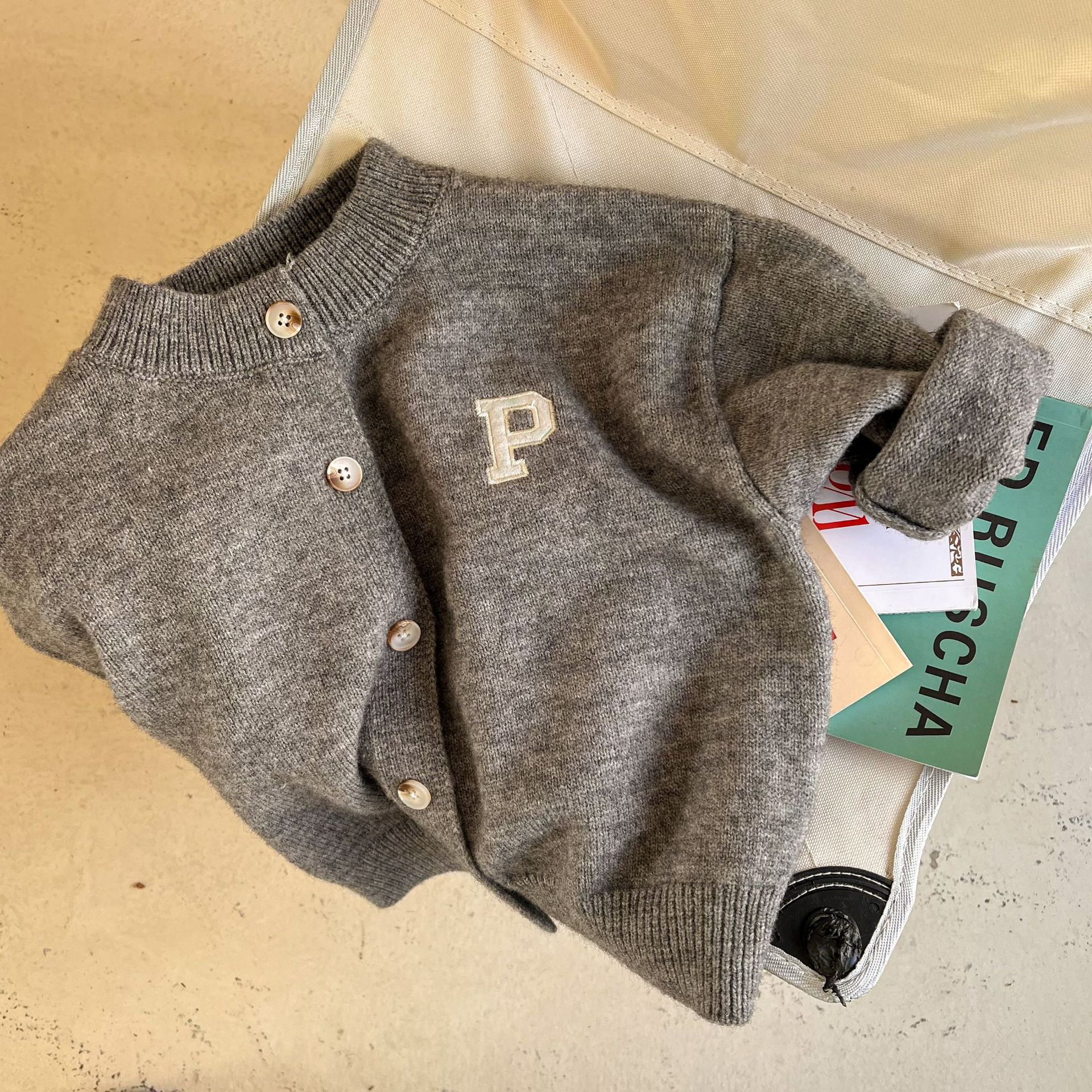 Picture of Trendy children's sweater 2023 spring new boys and girls round neck solid color letter wool cardigan baby casual coat